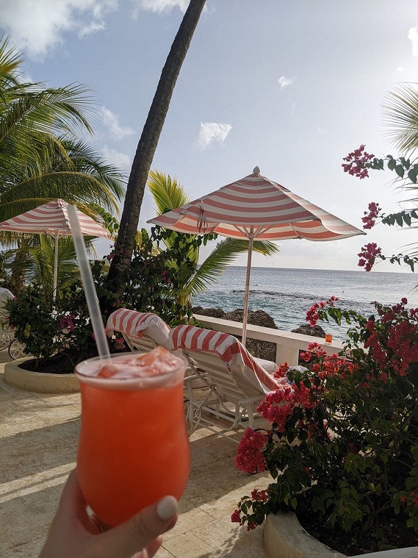 Enjoying a cocktail by the pool