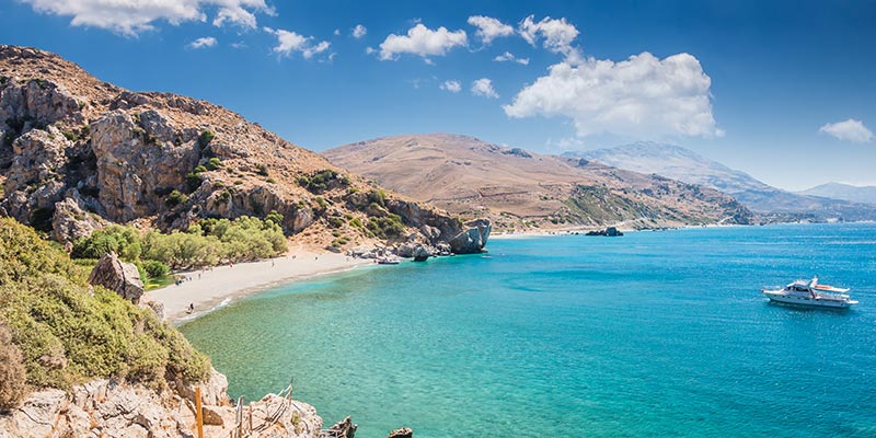 The beach front and cliffside of Crete