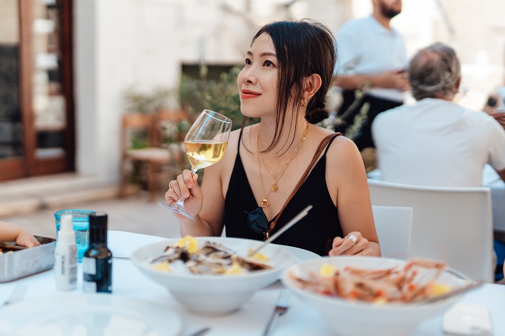 A woman at a restaurant in France