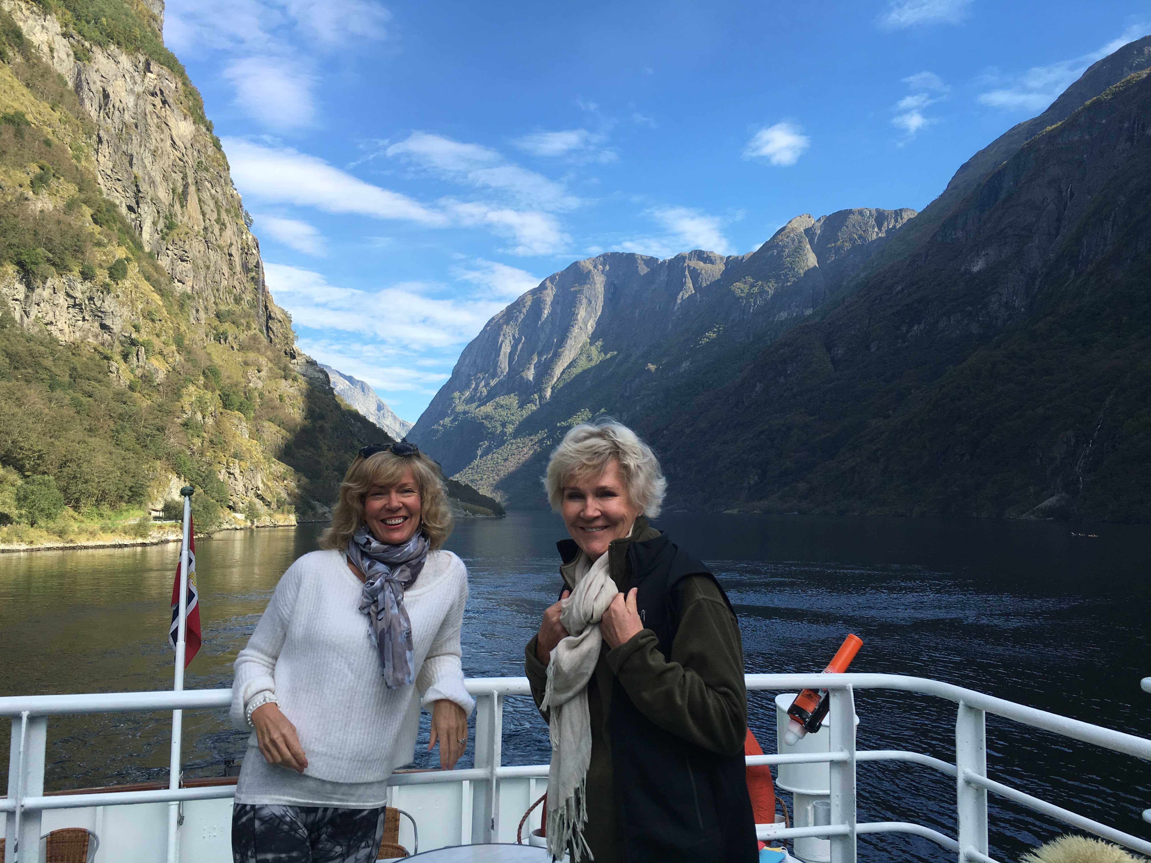 Jules and friend on a ferry through the fjords