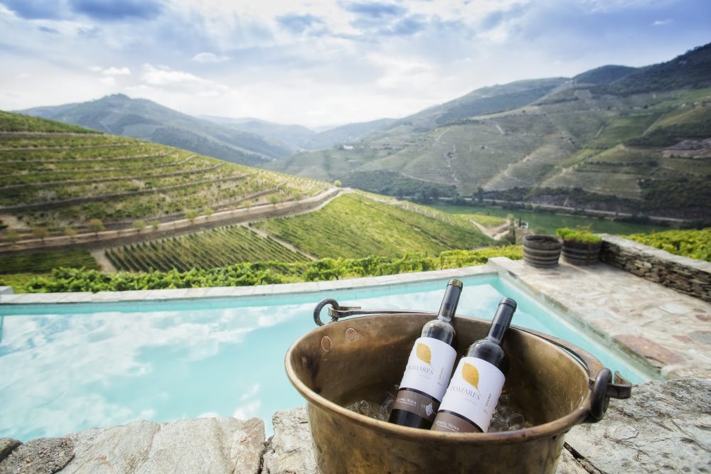 Enjoy Quinta Nova's wine by the pool