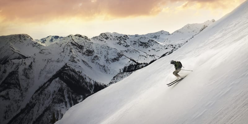 Skiing down a side of a mountain