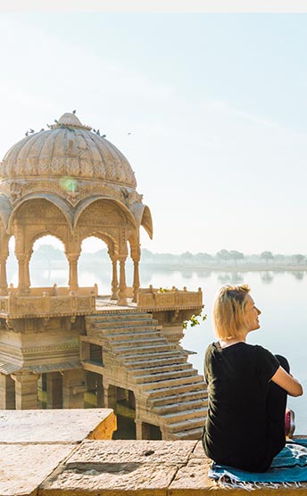Person sat in front of temple